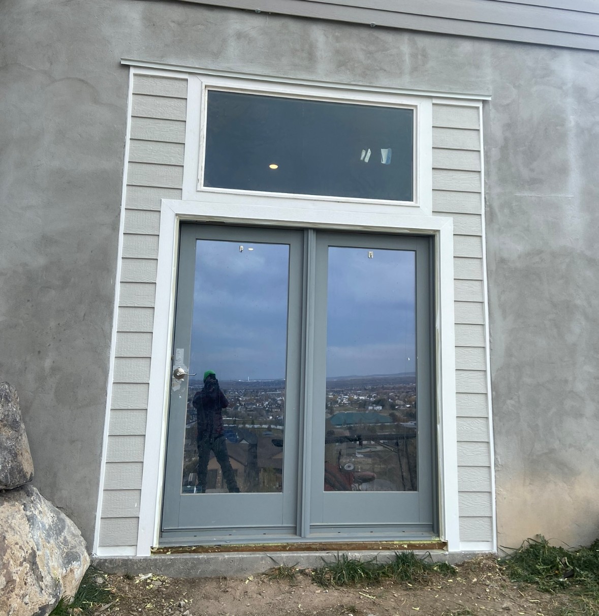 Completed exterior door installation and trim detail