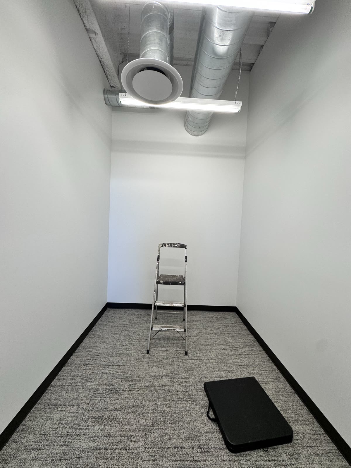 Draper corporate-office mother's room before wallpaper work
