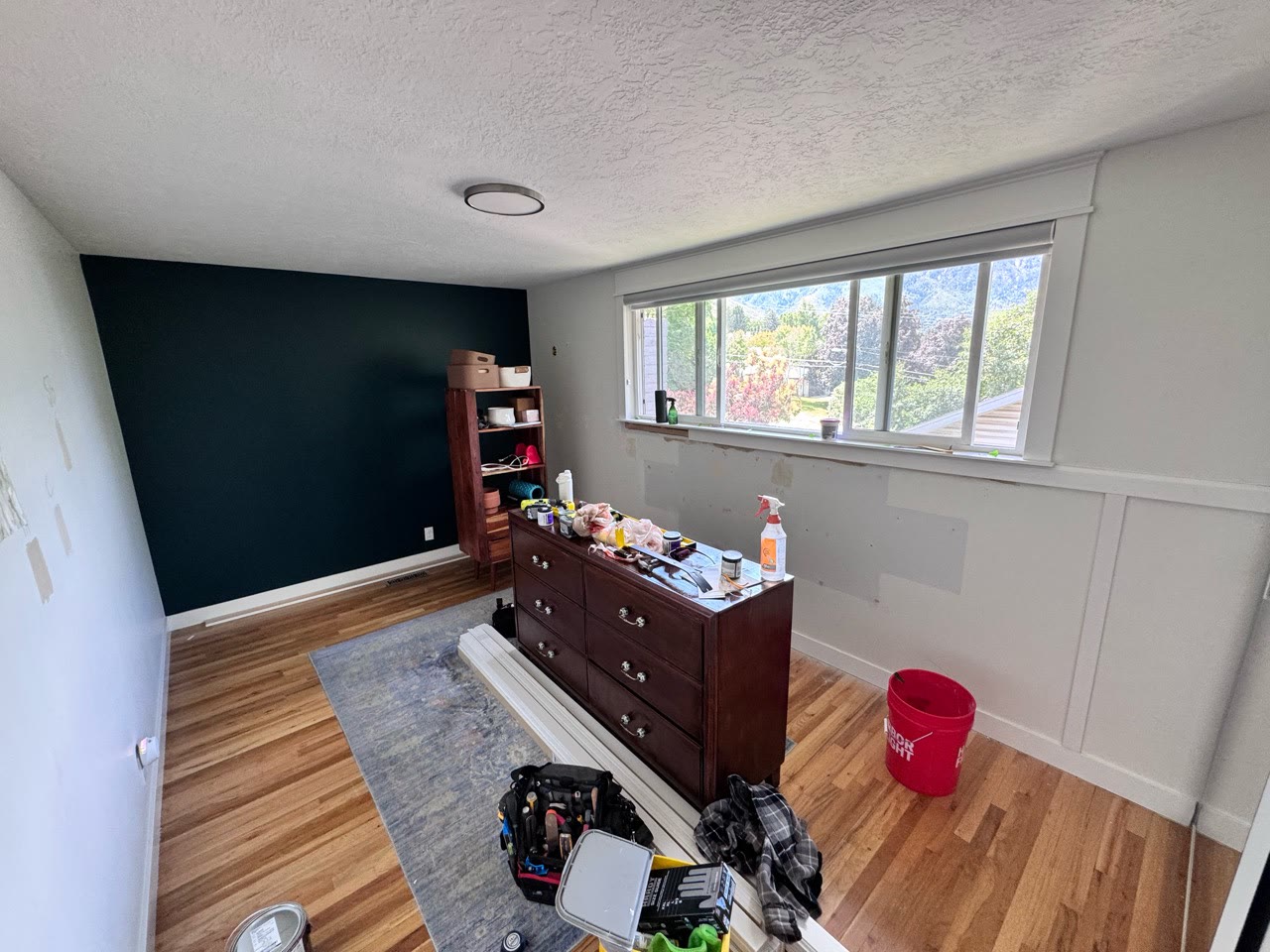 Nursery before accent trim, paint, and wallpaper work